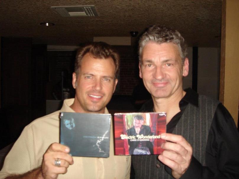 Chris Standring and Tim Sabatino, with the two album covers Tim photographed